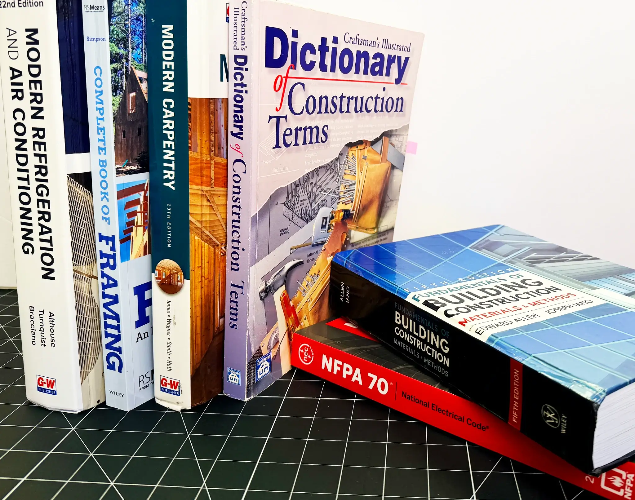 Construction reference books and study materials used to prepare for the California Class B contractor exam.