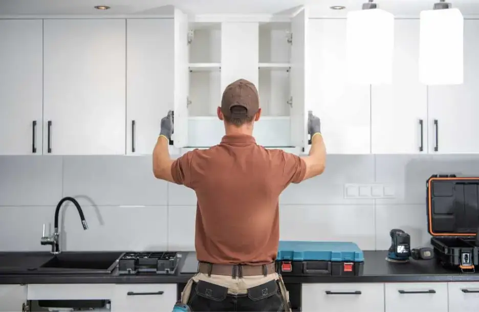 Licensed Finish Carpenter Installing Cabinets